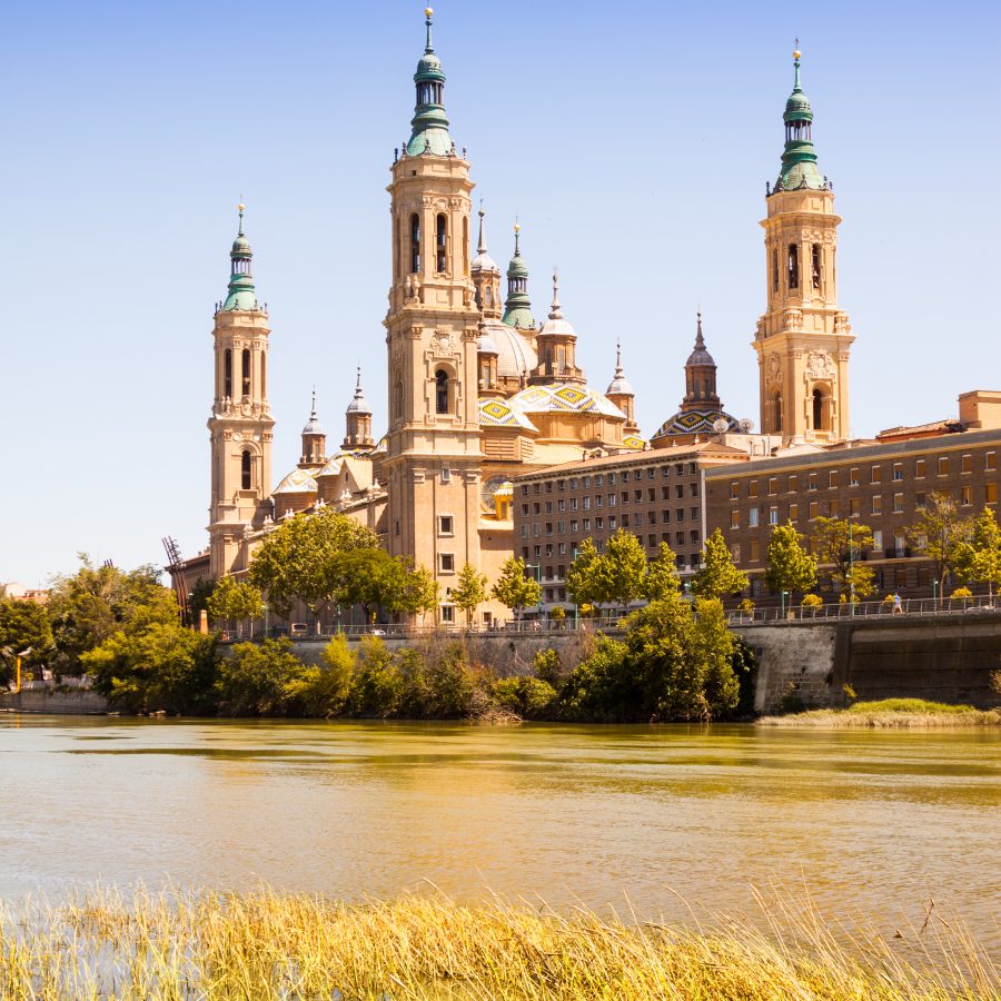 Basilica of Our Lady of the Pillar from river in Zaragoza. Aragon, Spain