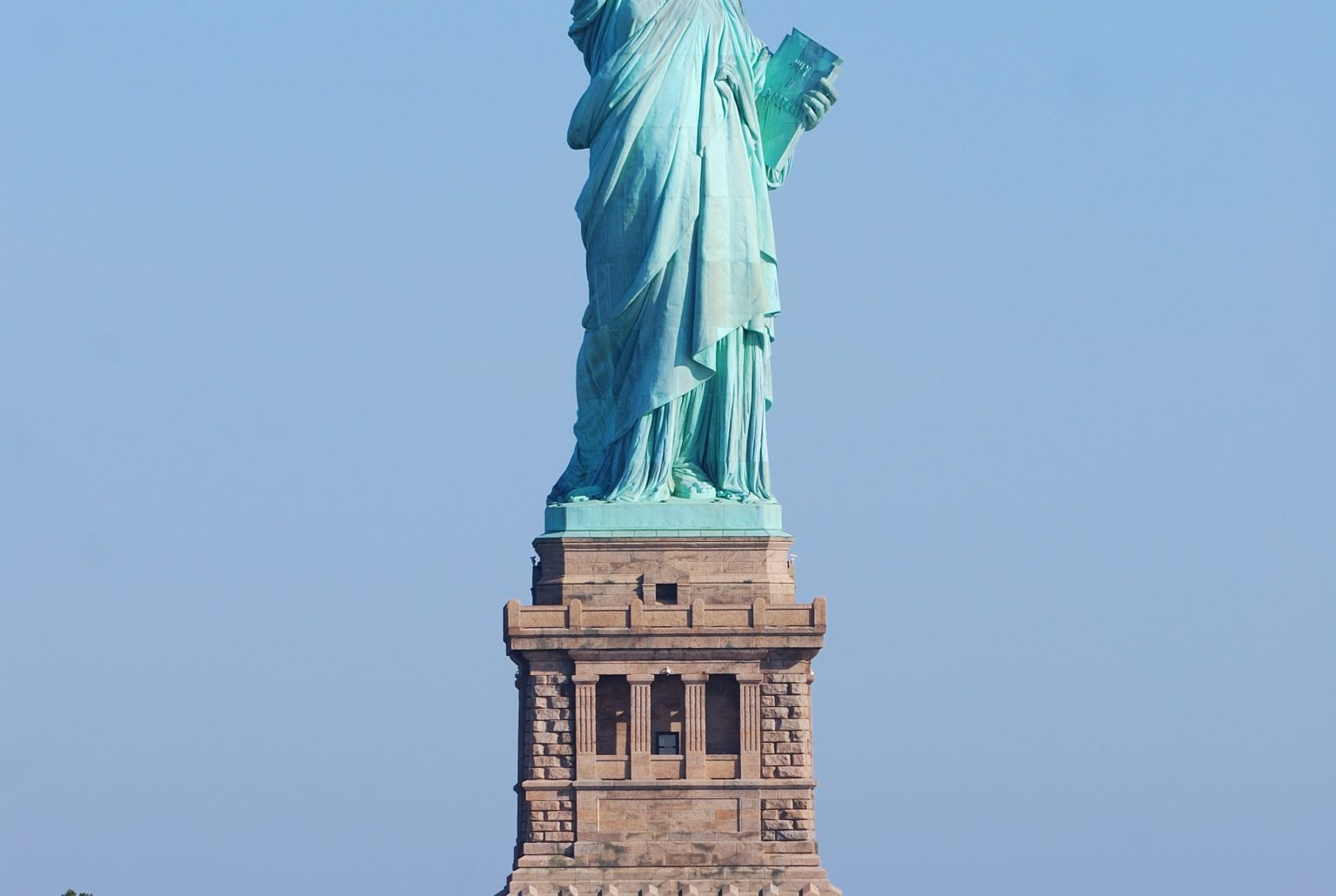 Statue of Liberty closeup as American landmark in New York City Manhattan over Hudson River